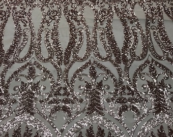 Rose gold diva design embroider with shiny sequins on a 4 way stretch power mesh-dresses-fashion-apparel-prom-nightgown-sold by the yard.