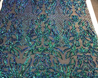 Green iridescent Sequins damask design embroidery on a black 4 way stretch power mesh-dressses-fashion-apparel-prom-nightgown-sold by yard.