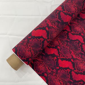 Red/Black python snake print on a 4 way stretch nylon spandex/58” wide/sold by the yard.