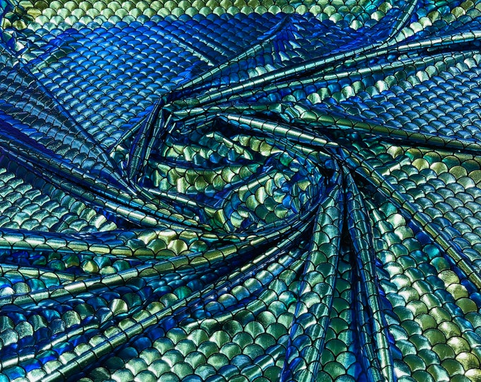 Green/blue iridescent mermaid fish scales on a black stretch spandex-sold by the yard.