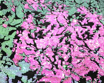 Hot Pink/ Mint Green iridescent sequins flip two tone camouflage  design on a black stretch velvet, Sold by the yard.