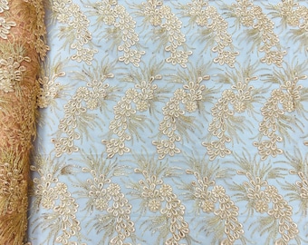 Blush peach feather design lace with metallic cord and embroider with sequins on a mesh-Sold by the yard.