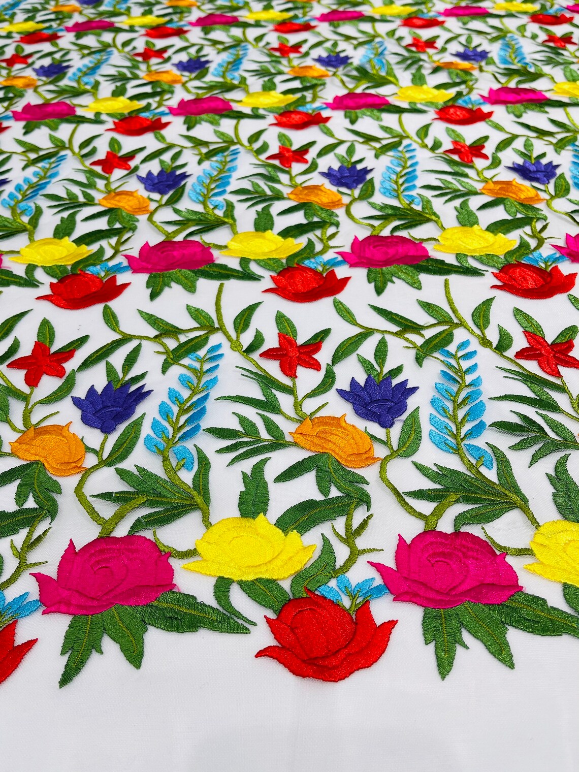 Multi Color Mexican Sarape Floral Design Embroider on a Purple Mesh Lace-Sold by the Yard.