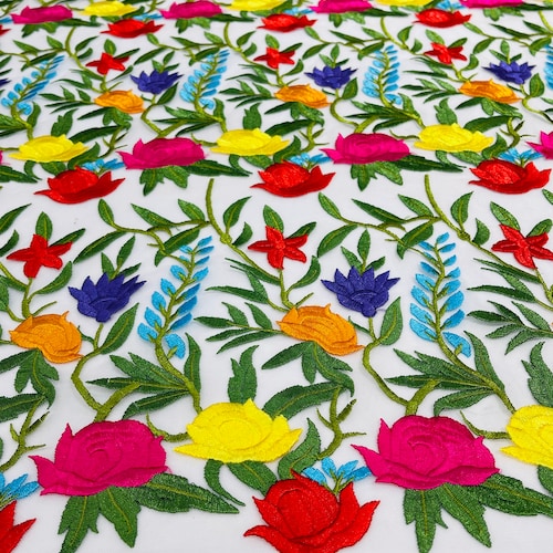 Multi Color Mexican Sarape Floral Design Embroider on a Teal Blue Mesh Lace-Sold by the Yard.