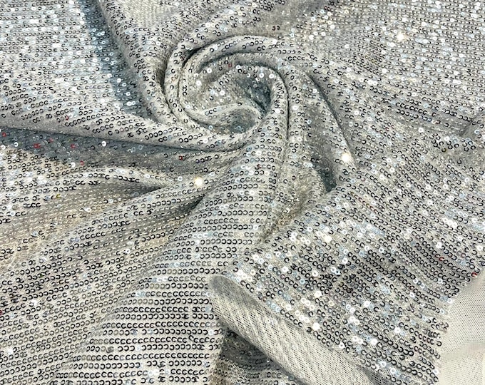 Silver chain shiny sequins design on a white 4 way stretch mesh fabric -prom-sold by the yard.