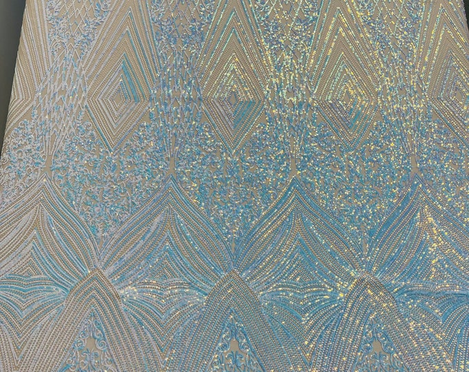 Clear Aqua Iridescent geometric diamond design with shiny sequins on a nude 4 way stretch mesh fabric- sold by the yard.