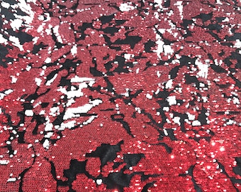 Red/White sequins flip two tone camouflage  design on a black stretch velvet, Sold by the yard.