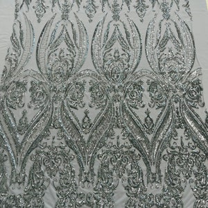 Silver Empire damask design with sequins embroider on a white 4 way stretch mesh fabric-sold by the yard.