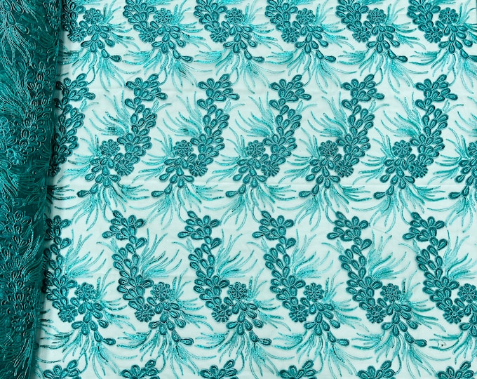 Teal green feather design lace with metallic cord and embroider with sequins on a mesh-Sold by the yard.