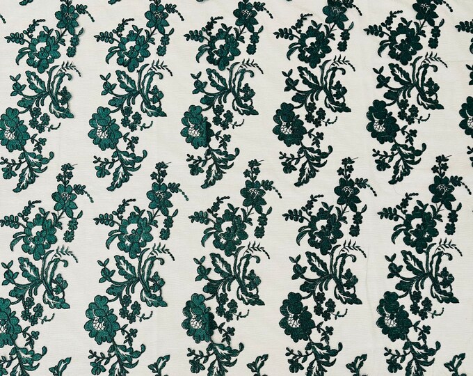 Hunter Green floral design embroider and corded on a mesh lace fabric-sold by the yard.