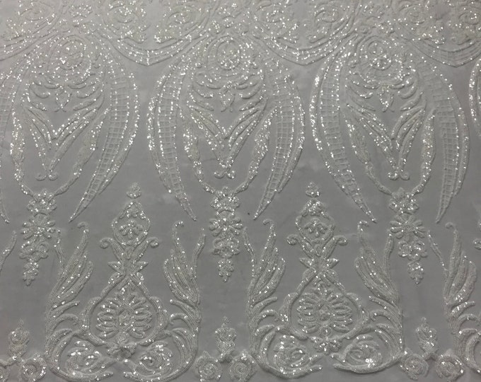 White princess design embroidery with sequins on a 4 way Stretch Mesh-dresses-prom-nightgown-fashion-apparel-sold by the yard.