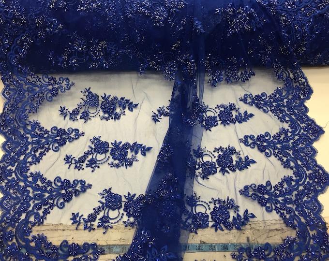 Elegant royal blue hand beaded flower design embroider on a mesh lace-prom-nightgown-bridal-wedding-sold by the yard.