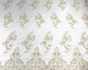 Ivory elegant hand beaded flower design embroider on a mesh lace-prom-sold by the yard.