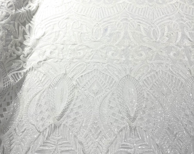 White royalty design embroider with shiny sequins on a 4 way stretch power mesh.