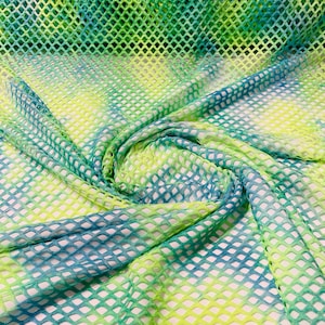 Green/Blue big fishnet diamond mesh tie dye with silver glitter 4 way stretch 58/60 inches wide. Sold by the yard.