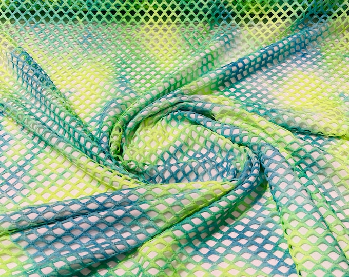 Green/Blue big fishnet diamond mesh tie dye with silver glitter 4 way stretch 58/60 inches wide. Sold by the yard.