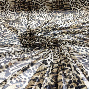 Brown/ Tan sheer exotic leopard design print on power mesh 4-way stretch 58/60” Sold by the yard