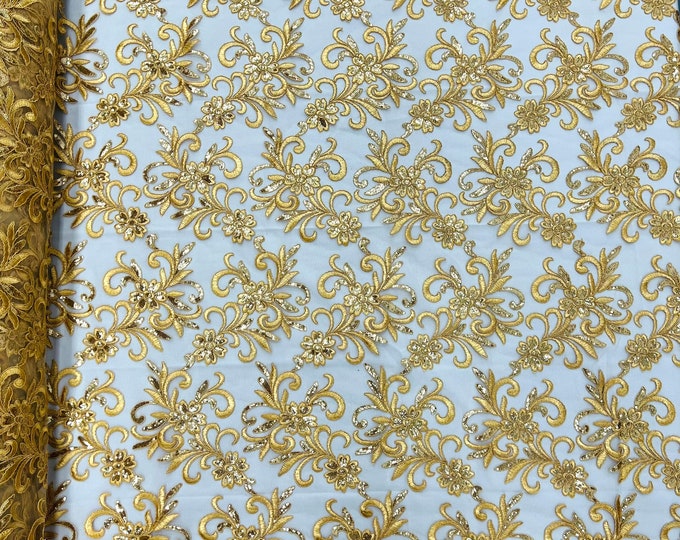 Gold corded flowers embroider with sequins on a mesh lace fabric-sold by the yard-