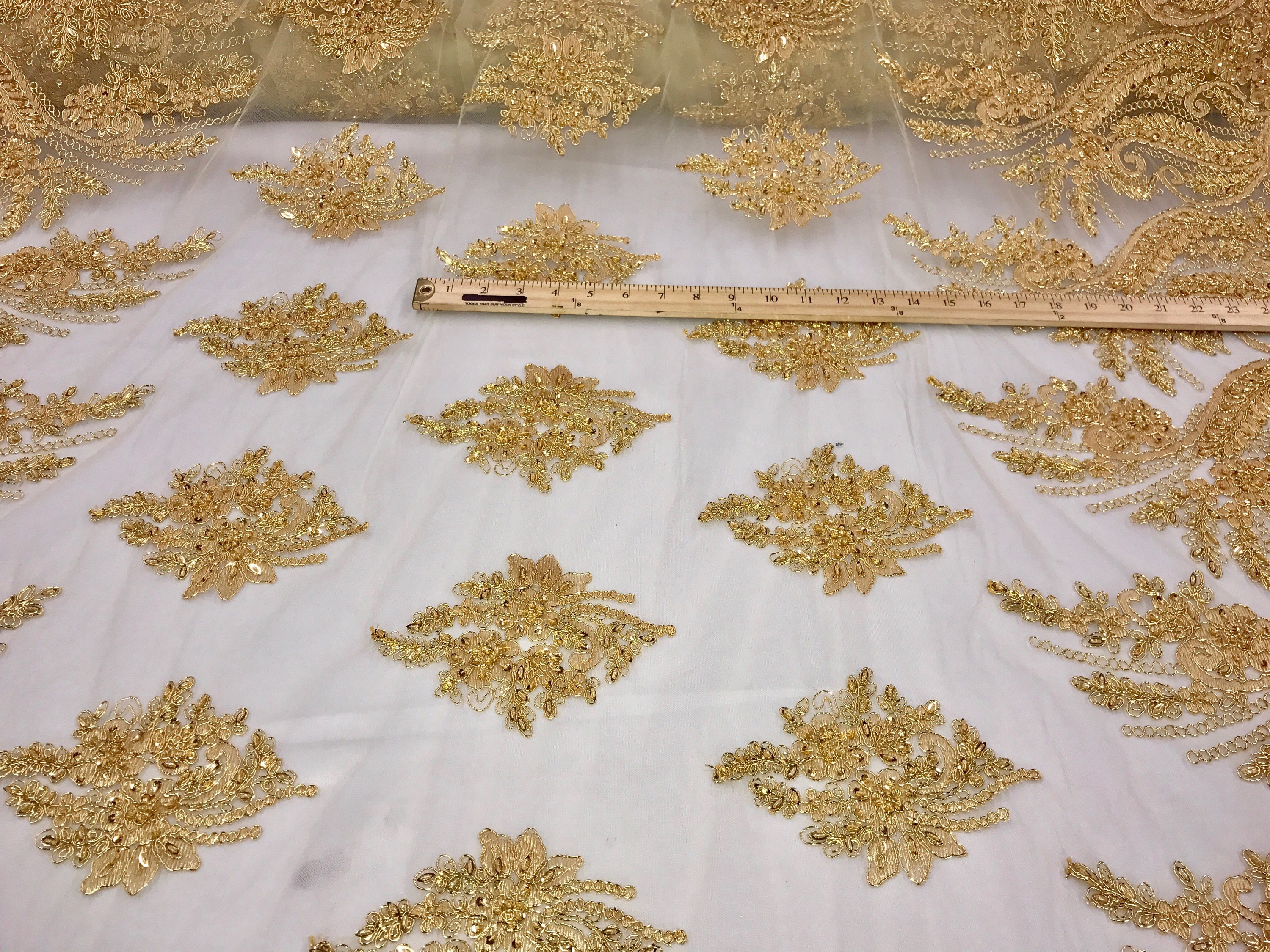 Metallic gold floral design embroidery and hand beaded with beads and ...
