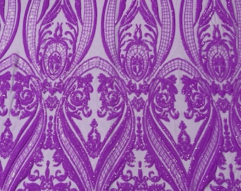 Orchid lilac empire design embroider with glossy sequins on a 4 way stretch mesh--sold by the yard.NEW!