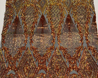Orange/red geometric diamond design with shiny iridescent sequins on a black 4 way stretch mesh-dresses-prom-nightgown-sold by the yard-