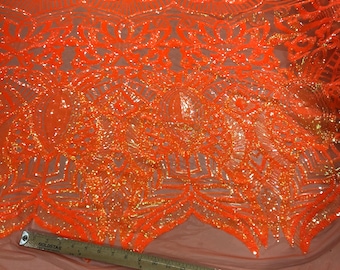 Neon orange royalty sequin design on a 4 way stretch mesh-prom-nightgown-sold by the yard.