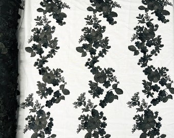 Black Diana 3d floral design embroider with pearls in a mesh lace-sold by the yard.
