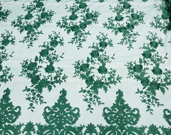 Hunter Green flowers flat lace embroider on a 2 way stretch mesh sold by the yard.