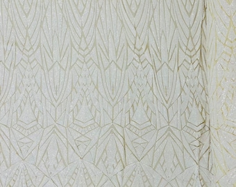 White Geometric shiny sequin design on a light nude 4 way stretch mesh-sold by the yard.
