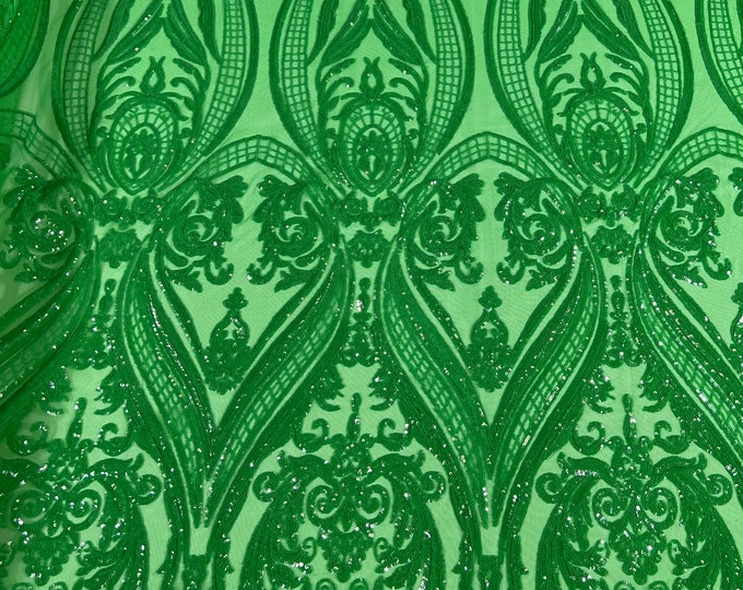 Green empire damask design with shiny sequins embroider on a 4 way stretch mesh fabric-sold by the yard.
