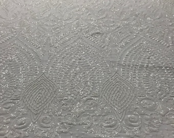 White geometric diamond design embroidery with sequins on a 4 way stretch mesh-dresses-fashion-prom-nightgown-sold by the yard.