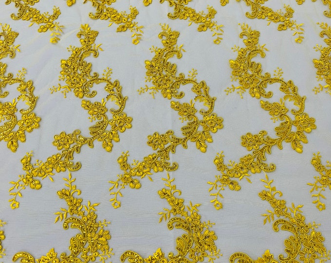 Yellow flower lace corded and embroider with sequins on a mesh-Sold by the yard.