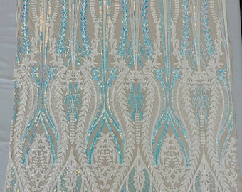 Aqua iridescent/white Two tone damask design with sequins embroider on a nude 4 way stretch mesh fabric-sold by the yard.