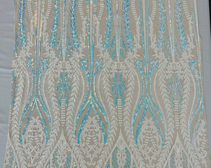 Aqua iridescent/white Two tone damask design with sequins embroider on a nude 4 way stretch mesh fabric-sold by the yard.