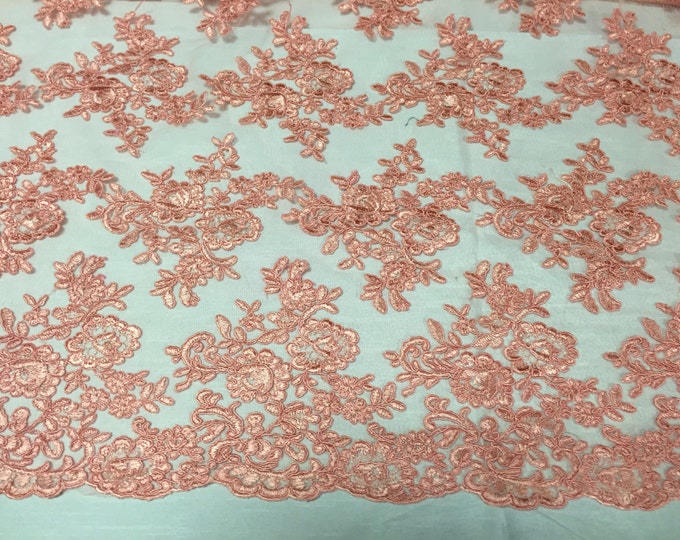 Coral modern roses embroider and corded on a mesh lace -yard