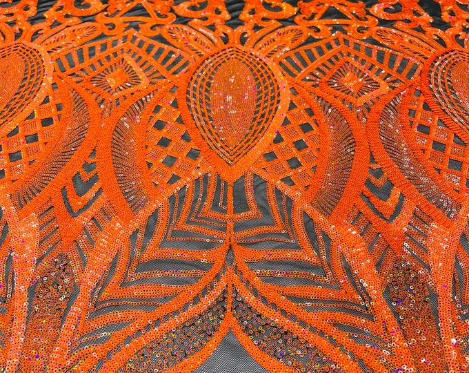 Neon orange iridescent royalty sequin design on a black 4 way stretch mesh-prom-sold by the yard.