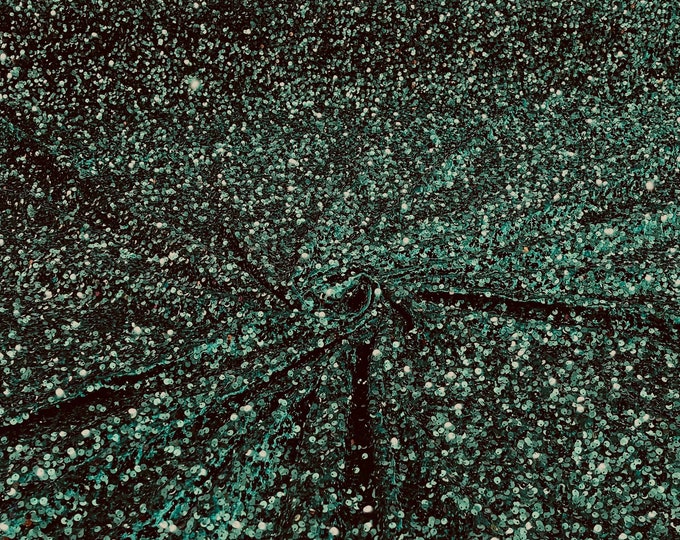 Hunter green 5mm sequins on a stretch velvet 2-way stretch, sold by the yard.