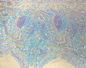 Aqua clear iridescent royalty sequin design on a champagne 4 way stretch mesh-prom-sold by the yard.