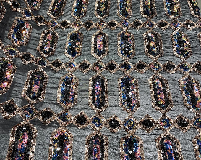 Black/blue iridescent Jewel sequin design on a black 4 way stretch mesh fabric -sold by the yard.