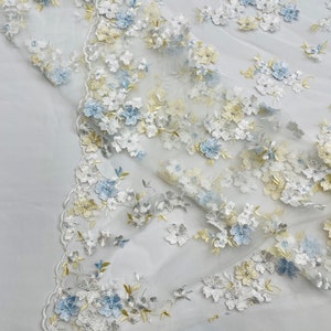 Off white Multi color 3d floral Daisy design embroider with pearls in a mesh lace fabric -sold by the yard.