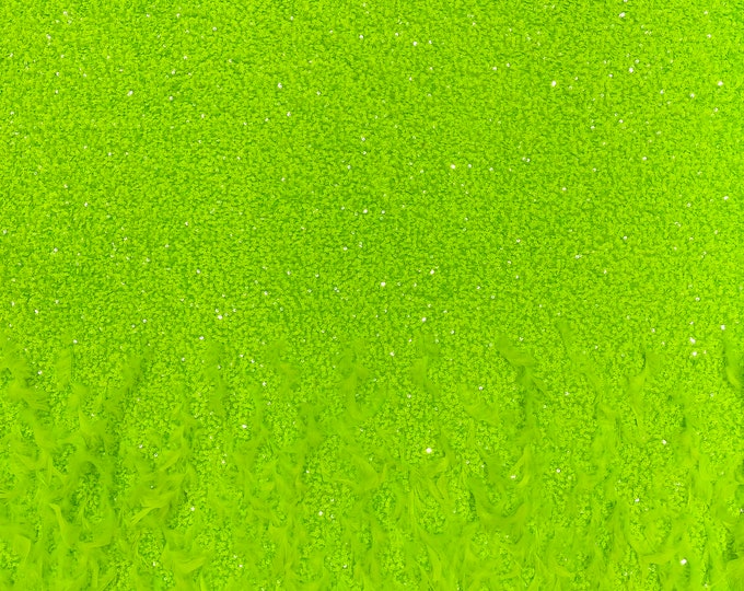 Neon Green 5mm sequins on a stretch velvet with feathers  2-way stretch, sold by the yard