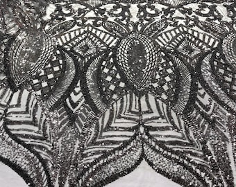 Black royalty sequin design on a black 4 way stretch mesh-prom-sold by the yard.