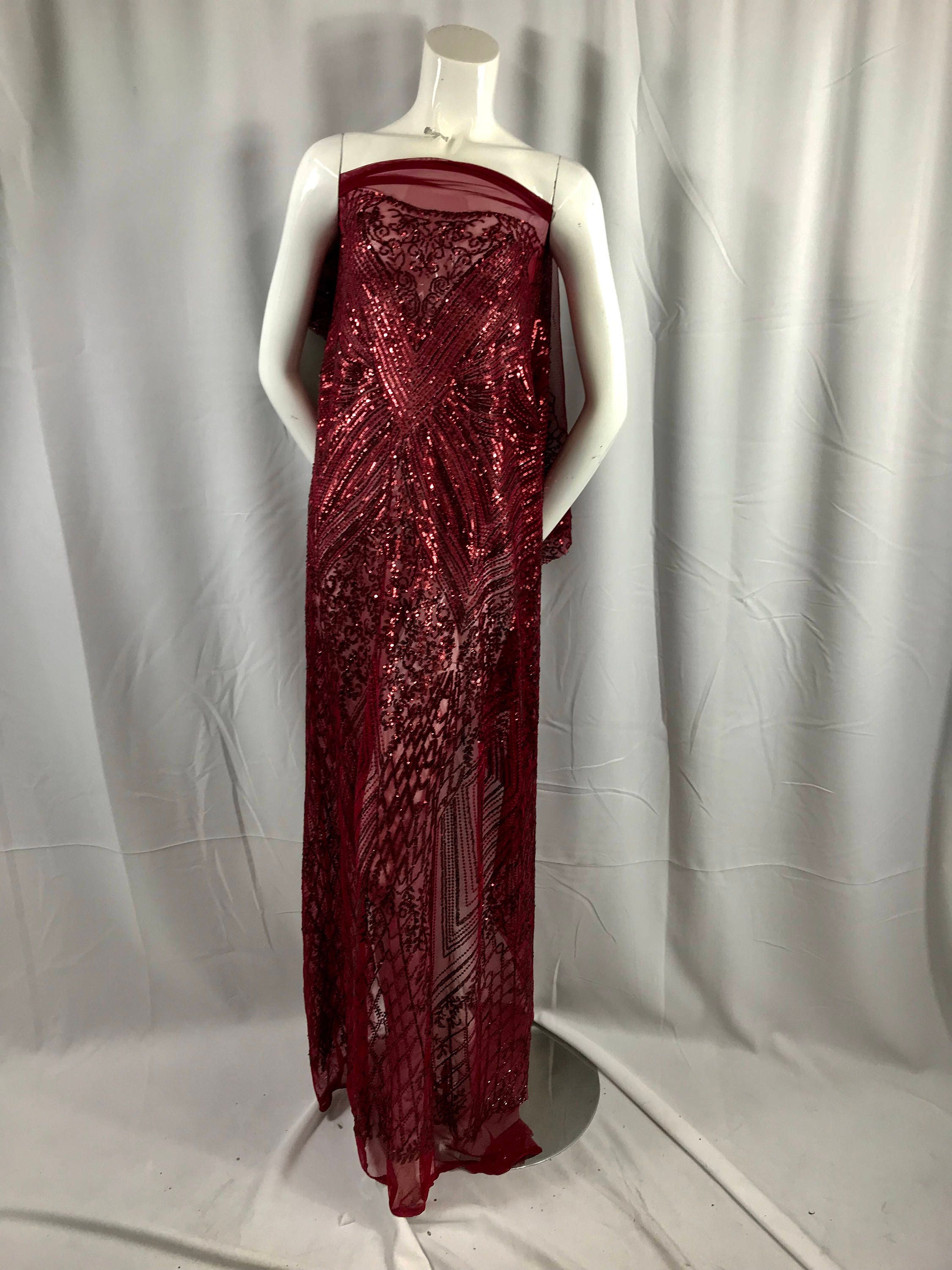 Burgundy geometric diamond design embroider with sequins on a 2