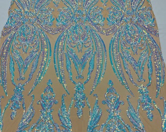 Aqua Iridescent shiny sequin damask design on a Nude 4 way stretch mesh-sold by the yard.
