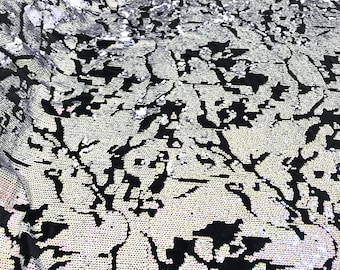 Pink/White iridescent sequins flip two tone camouflage  design on a black stretch velvet, Sold by the yard.