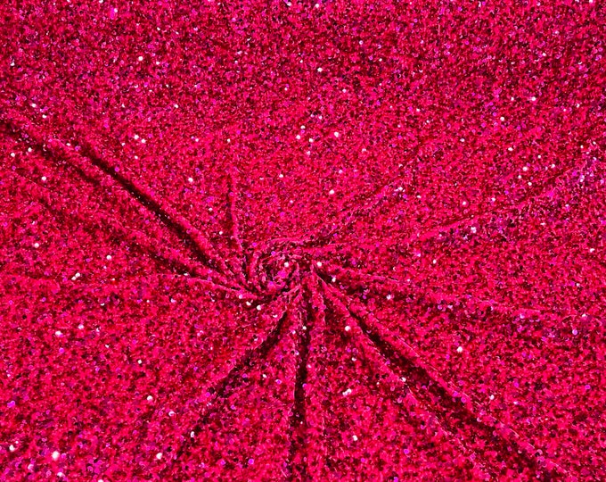 Fuchsia 5mm sequins on a stretch velvet 2-way stretch, sold by the yard.