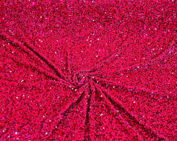 Fuchsia 5mm sequins on a stretch velvet 2-way stretch, sold by the yard.