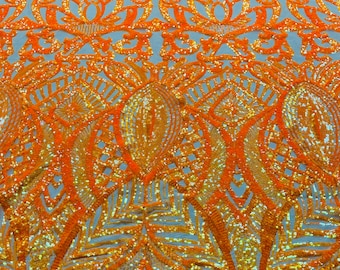 Orange iridescent royalty sequin design on a 4 way stretch dark nude mesh-prom-nightgown-sold by the yard.