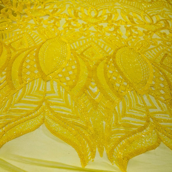 Bright yellow royalty sequin design on a yellow 4 way stretch mesh-prom-sold by the yard.