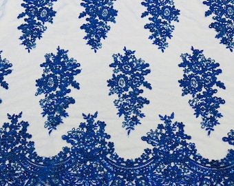 Royal blue corded embroider with sequins on a mesh lace fabric-prom-sold by the yard.